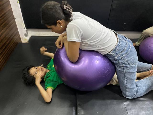 Sensory integration with a therapy ball