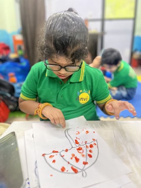 Finger-painting an umbrella
