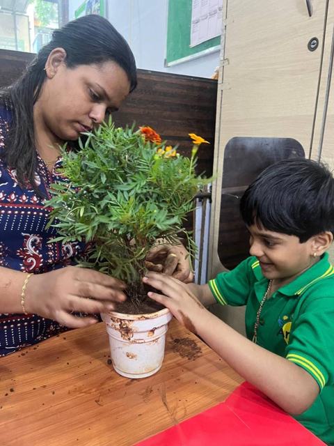 Gardening side by side with a teacher