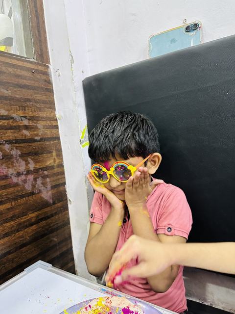 Holi celebration — playing with colours