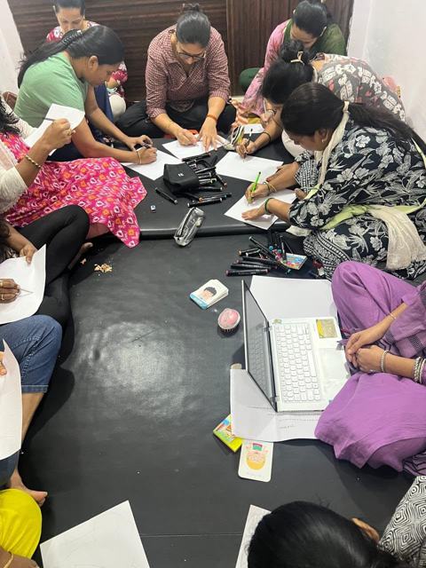 Parents working through an activity sheet
