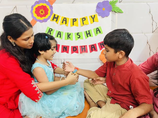 Tying rakhis together on Raksha Bandhan