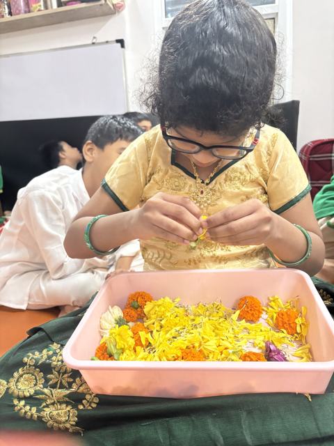 Sorting marigold petals — sensory play